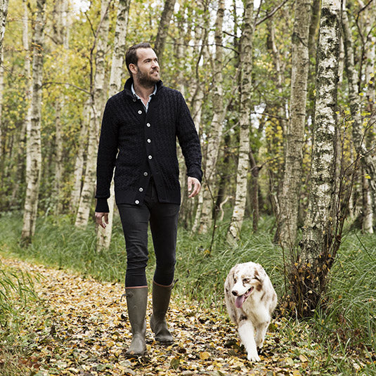 owner taking dog on walk
